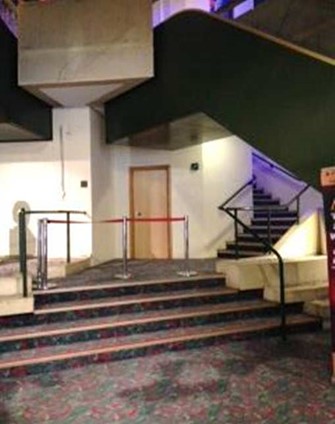 Staircase towards the back of the ground floor foyer
