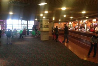 Level 3 foyer and small stage area with seating