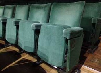 Green auditorium foldup seats