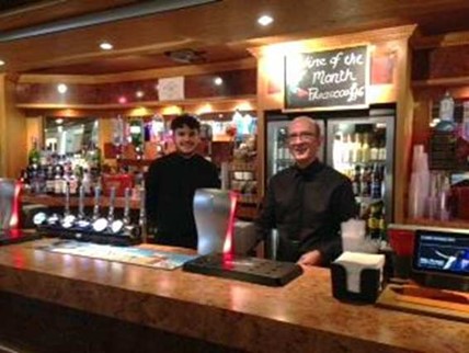 Bar staff wearing black shirts